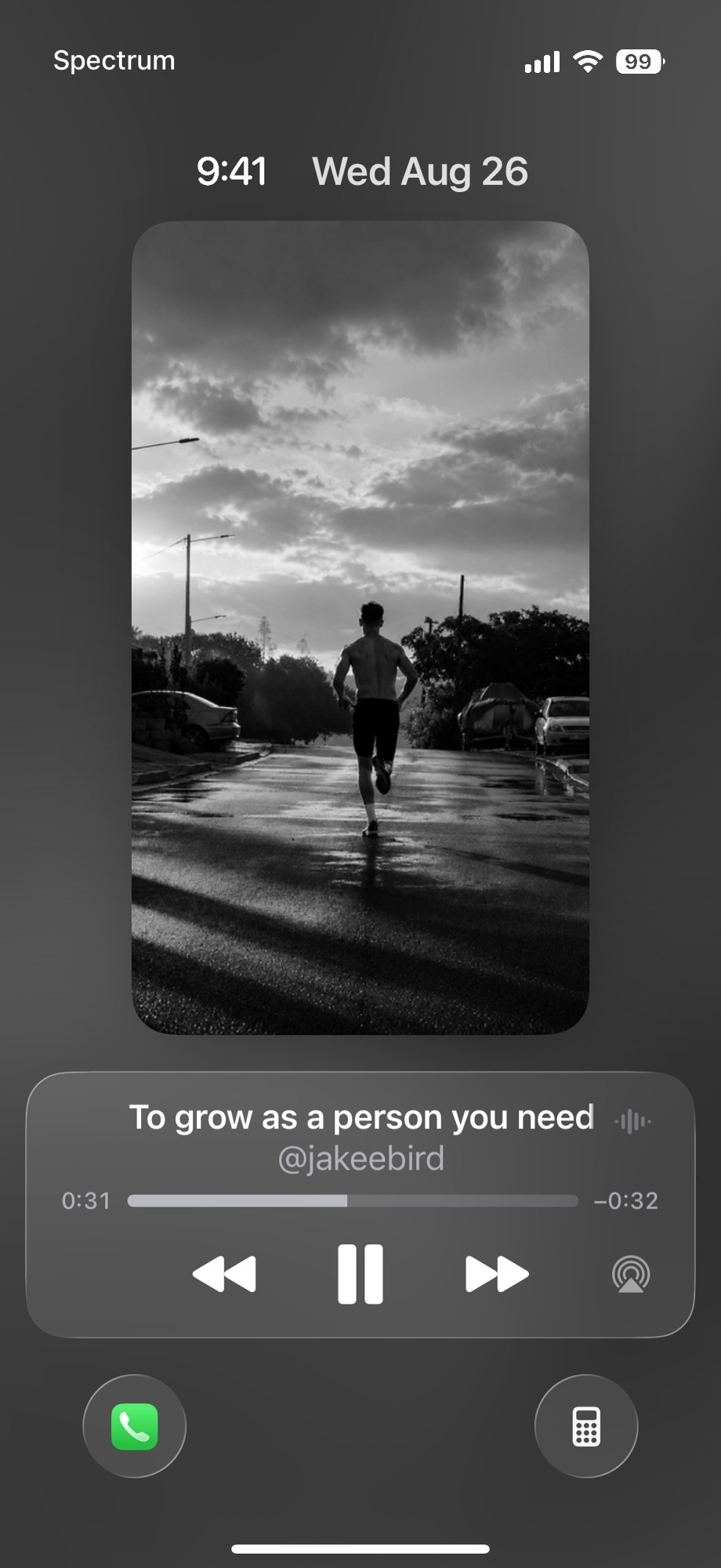 iPhone lock screen playing a Reelign reel with full media controls